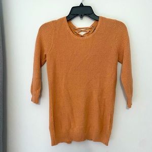Orange sweater with lace back